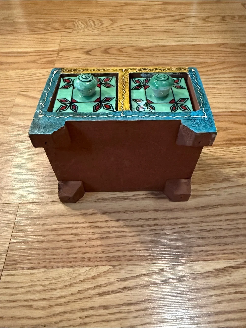 A hand-painted wooden & ceramic mini storage chest or trinket box